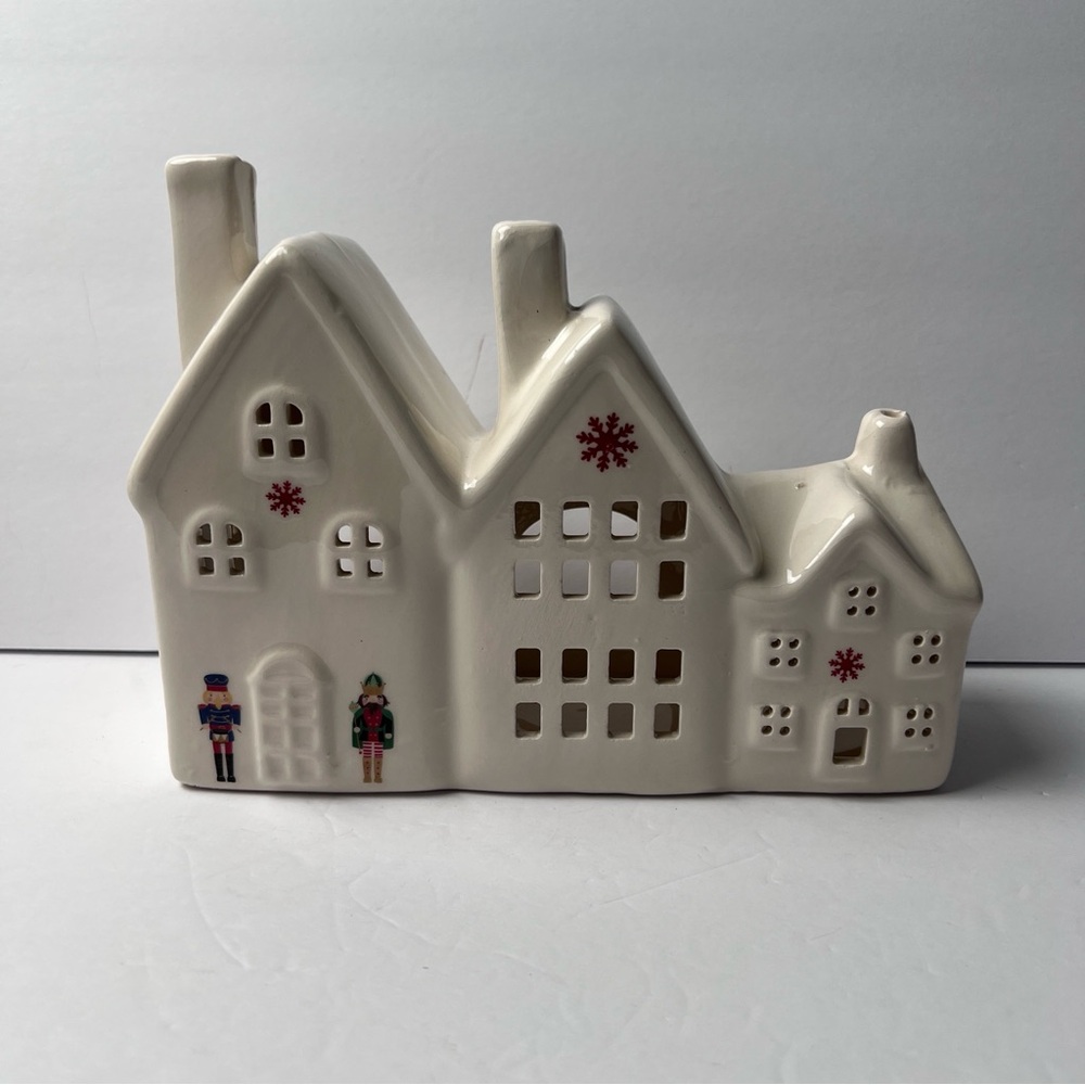 Charming White Ceramic Holiday Village House with Nutcrackers